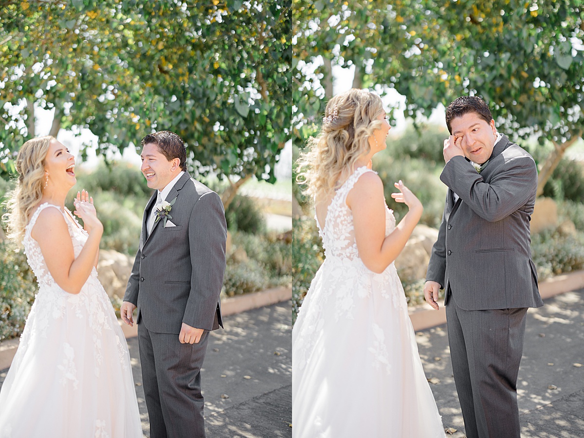 bride and groom share emotional first look before romantic California vineyard wedding