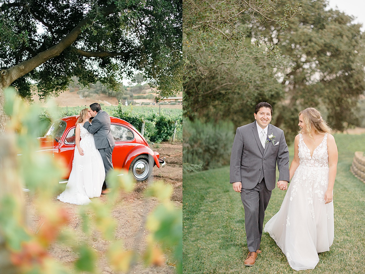 bride and groom pose for destination wedding photographer in california vineyard with red vintage beetle getaway car