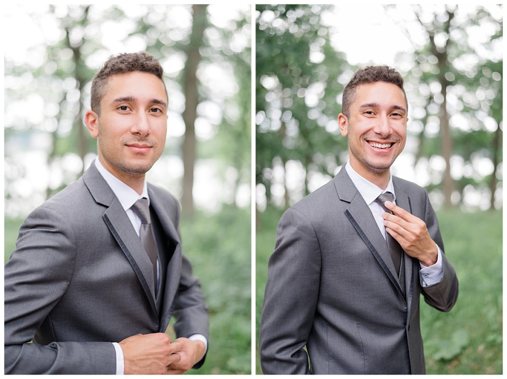 man stands outside in suit and adjusts tie and coat by Hunter Hennes Photography 