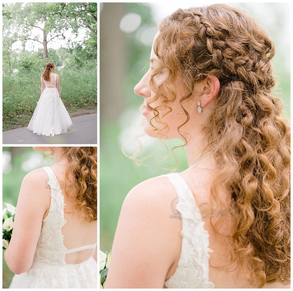 bride shows off details on the back of her lace dress by Hunter Hennes Photography 