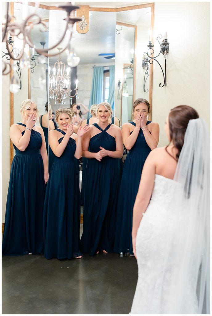 bridesmaids see bride for first time by destination photographer