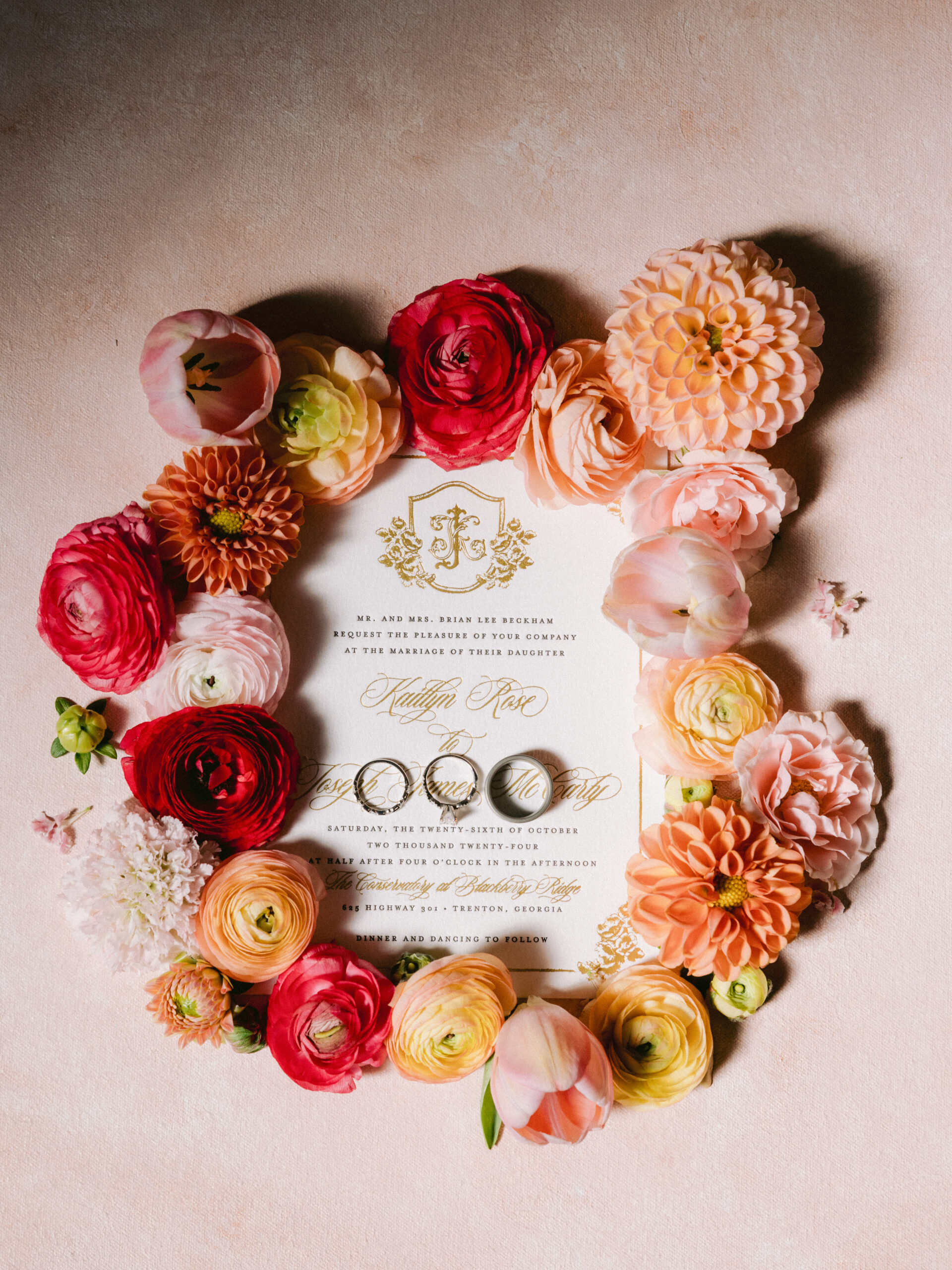 invitation surrounded by florals
