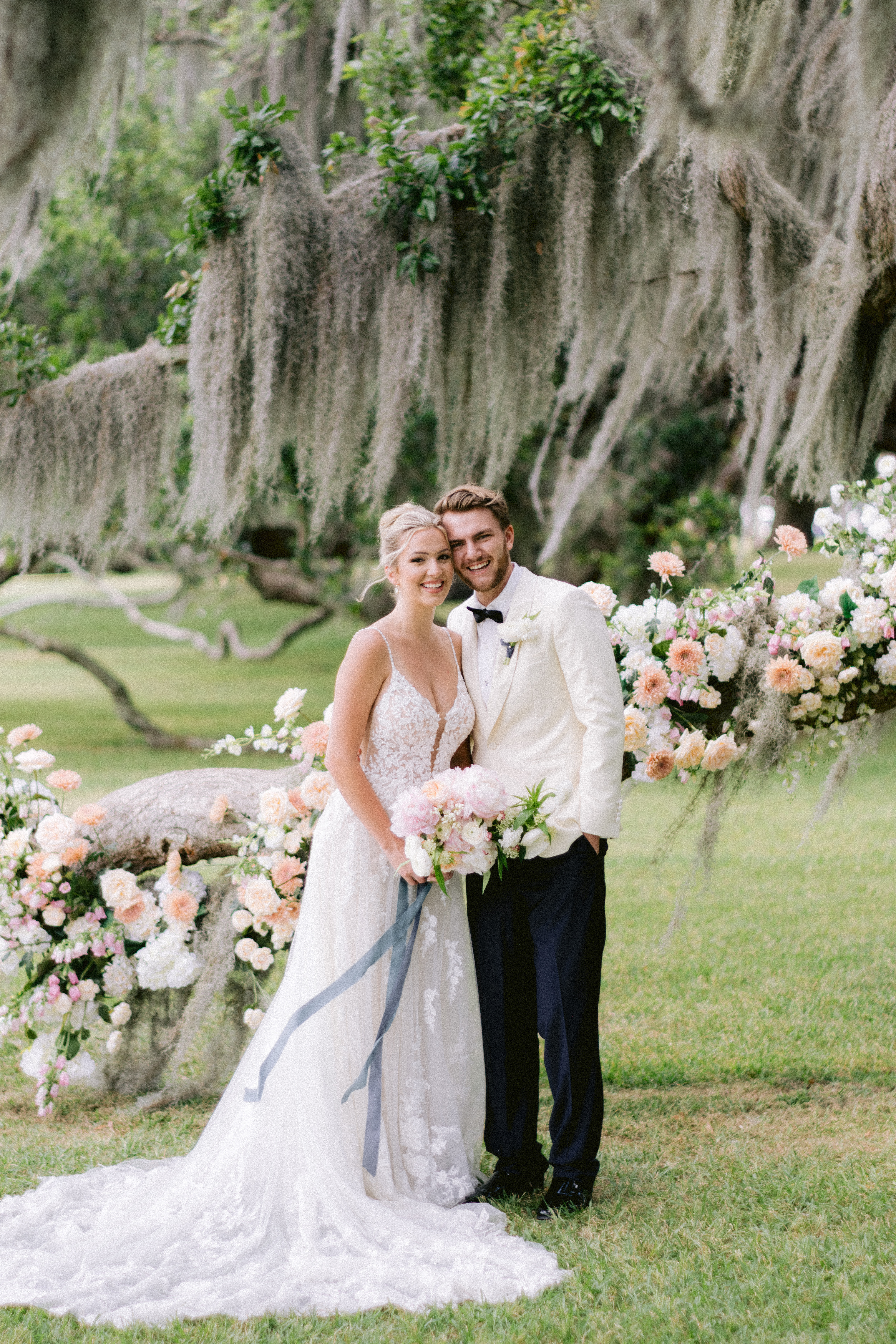wedding couple in front of ceremony spot