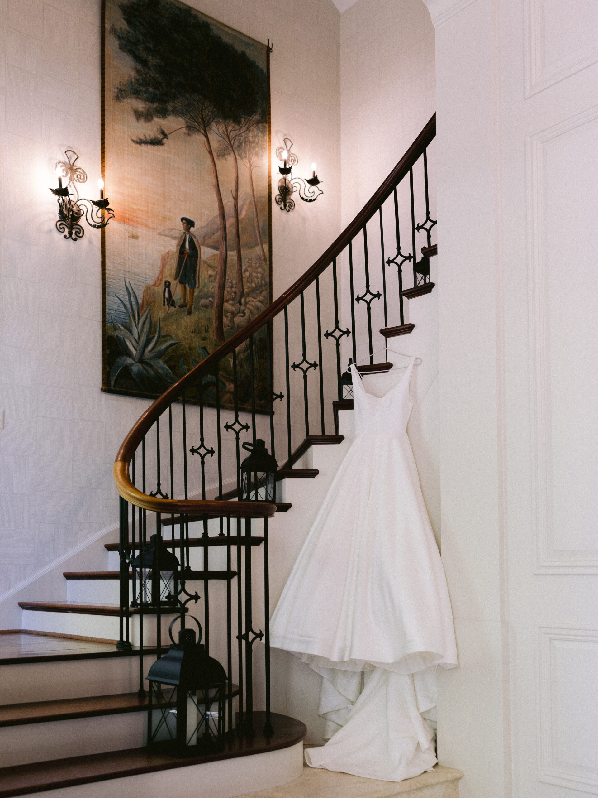 Private Estate Wedding white dress hung on stairs