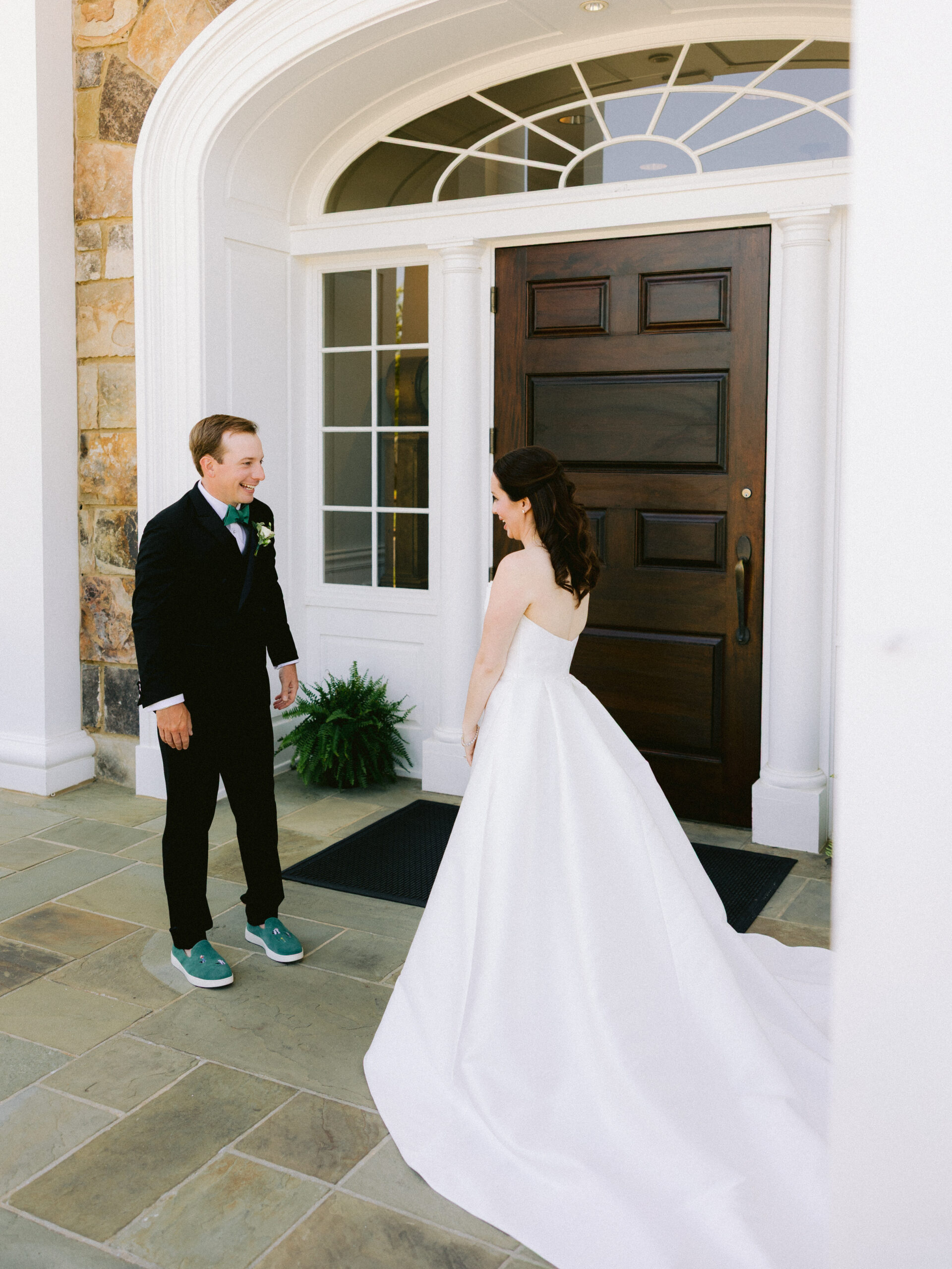 bride first look with groom at country club wedding
